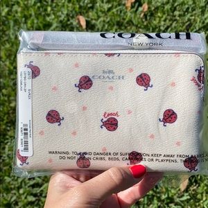 Coach Ladybug wristlet